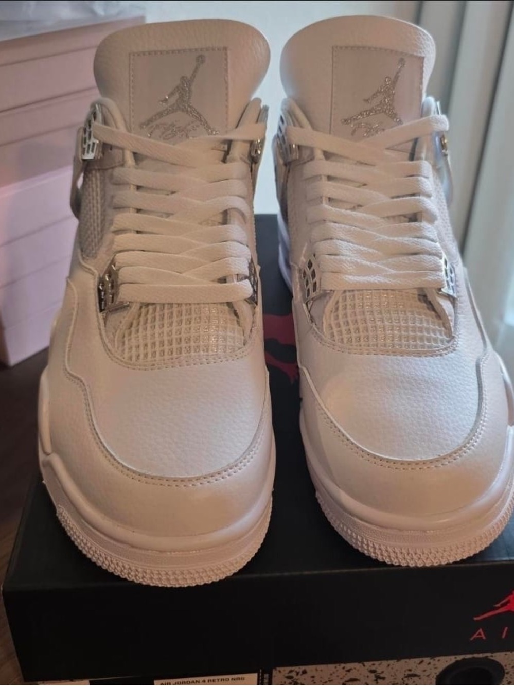 Jordan Men’s White Leather Retro 4 Sneakers